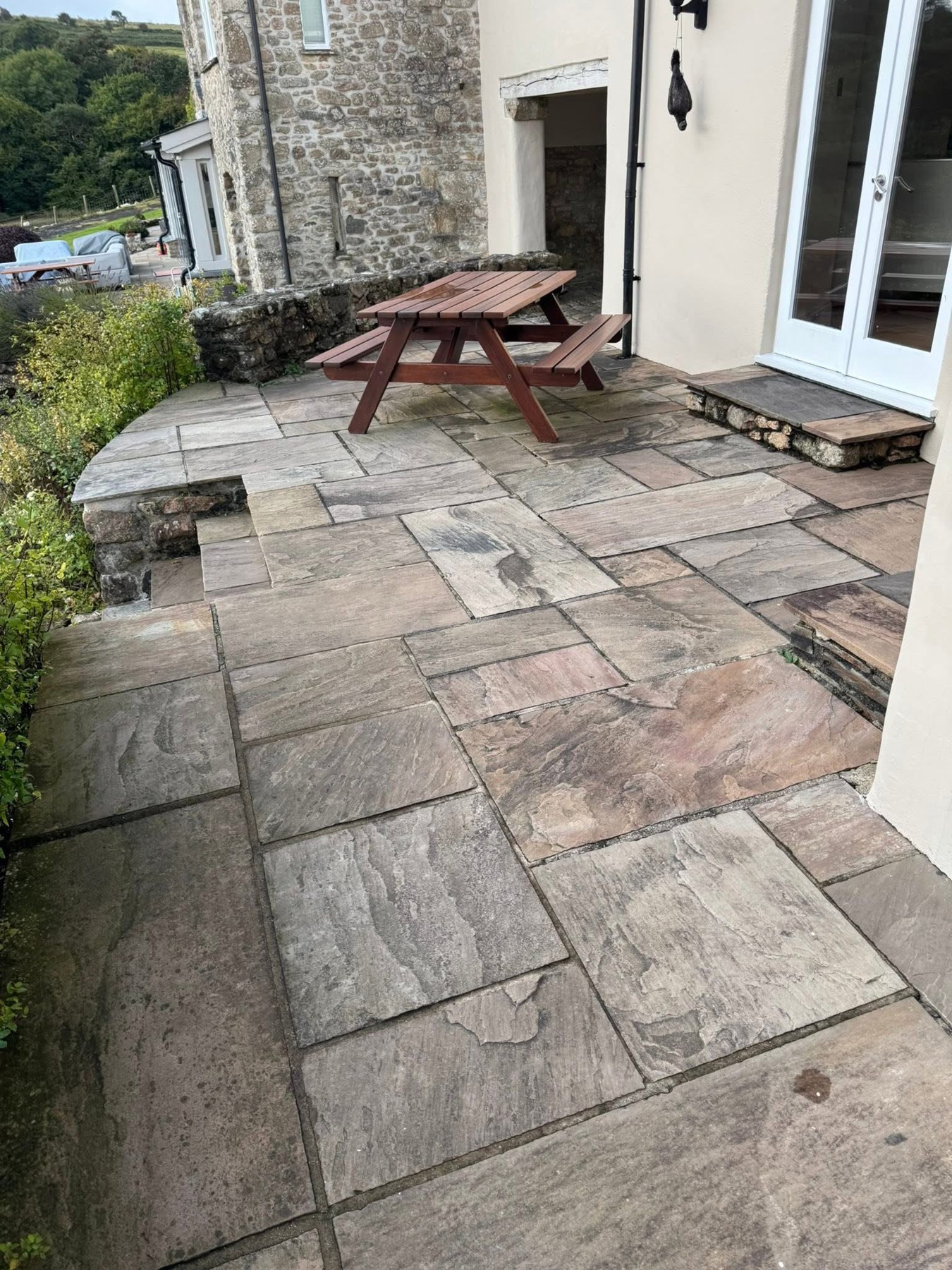 Stone patio before cleaning